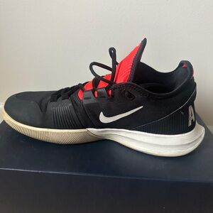 Nike Black and Red Air tennis shoes.